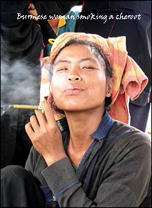 Burmese woman smoking a cheroot copy text